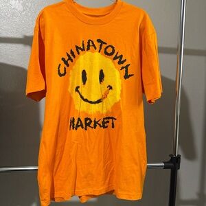 Chinatown Market Orange Smiley Face Tee